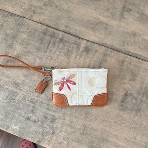 Coach Cream and Tan Wristlet with Dragonfly Design